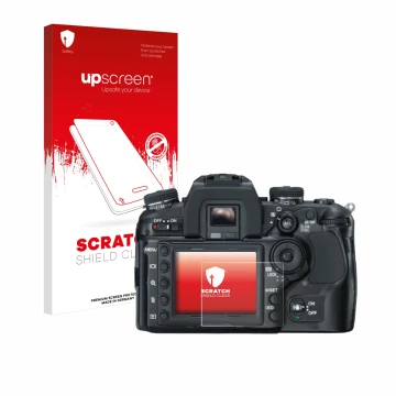 Face avant d’un emballage produit avec le logo de la marque upscreen. À côté, l’appareil Konica Minolta Dynax 7D est représent