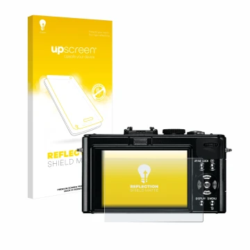 Face avant d’un emballage produit avec le logo de la marque upscreen. À côté, l’appareil Leica D-Lux 5 est représenté avec la 