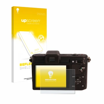 Face avant d’un emballage produit avec le logo de la marque upscreen. À côté, l’appareil Nikon 1 V1 est représenté avec la pro