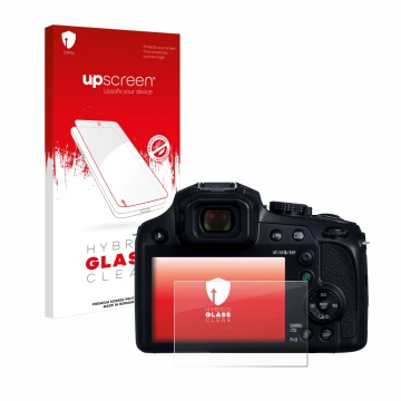Face avant d’un emballage produit avec le logo de la marque upscreen. À côté, l’appareil Panasonic Lumix DC-FZ82D est représen