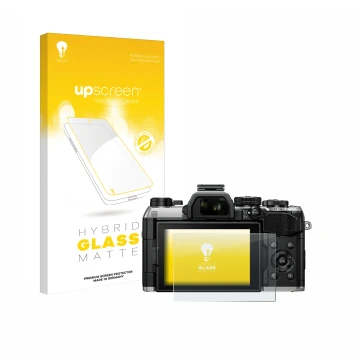 Face avant d’un emballage produit avec le logo de la marque upscreen. À côté, l’appareil Olympus OM System OM-5 Mark II est re