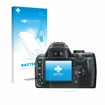 Face avant d’un emballage produit avec le logo de la marque upscreen. À côté, l’appareil Nikon D60 est représenté avec la prot