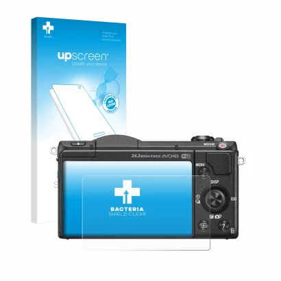 Face avant d’un emballage produit avec le logo de la marque upscreen. À côté, l’appareil Sony Alpha 5100 (DSLR-A5100) est repr