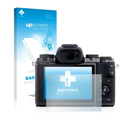 Face avant d’un emballage produit avec le logo de la marque upscreen. À côté, l’appareil Canon EOS M5 est représenté avec la p