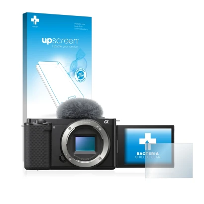 Face avant d’un emballage produit avec le logo de la marque upscreen. À côté, l’appareil Sony Alpha ZV-E10 est représenté avec