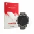 Face avant d’un emballage produit avec le logo de la marque upscreen. À côté, l’appareil Garmin Fenix 9 (47 mm) est représenté